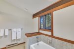 Separate tub in the master bathroom